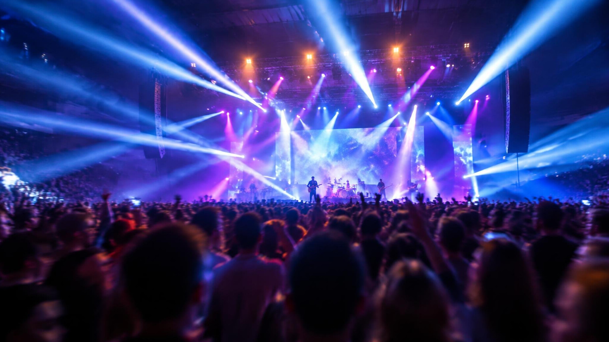 Stage lights and crowd at a live show
